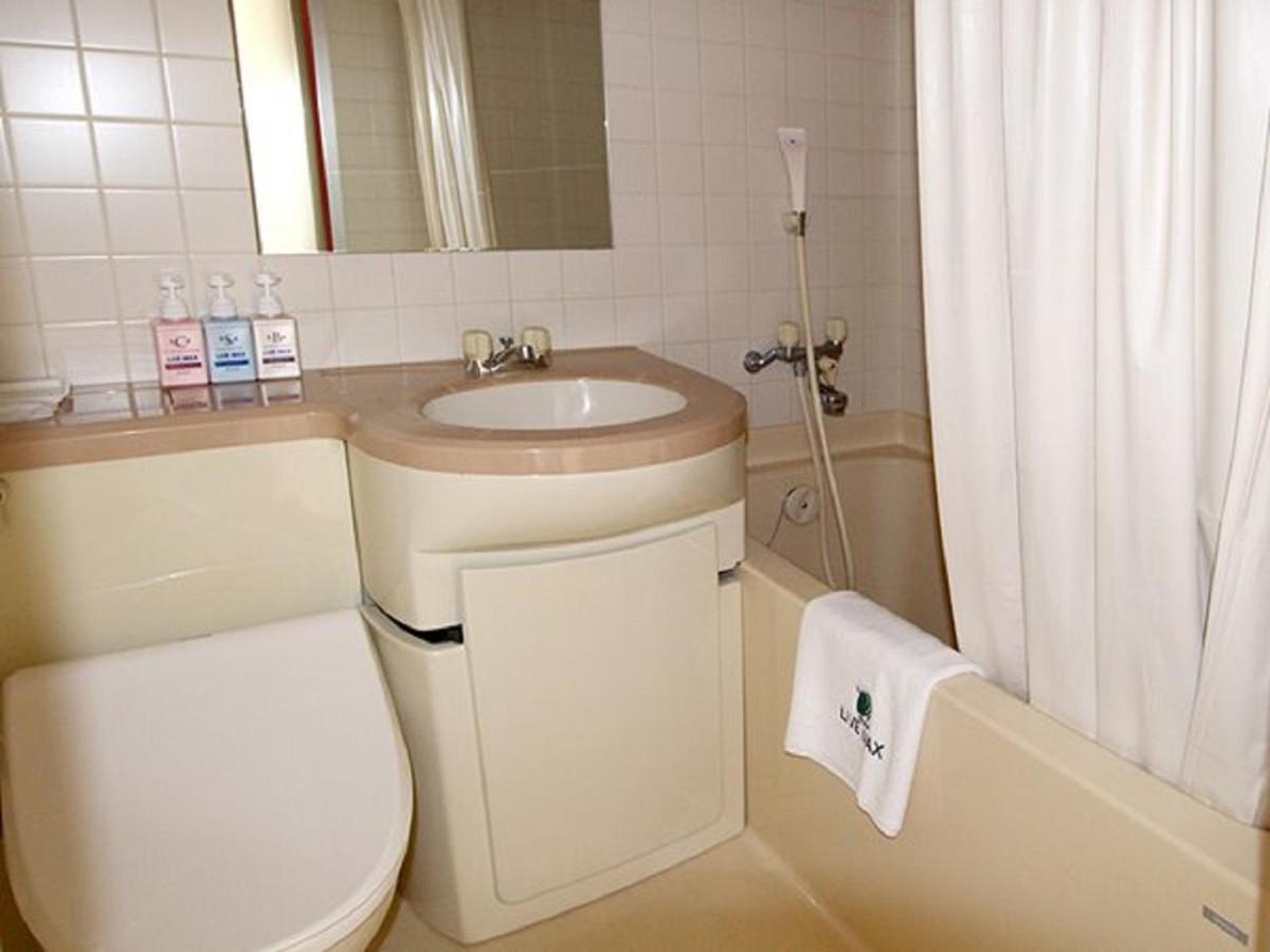 Hotel Livemax Budget Esaka Suita Exterior foto